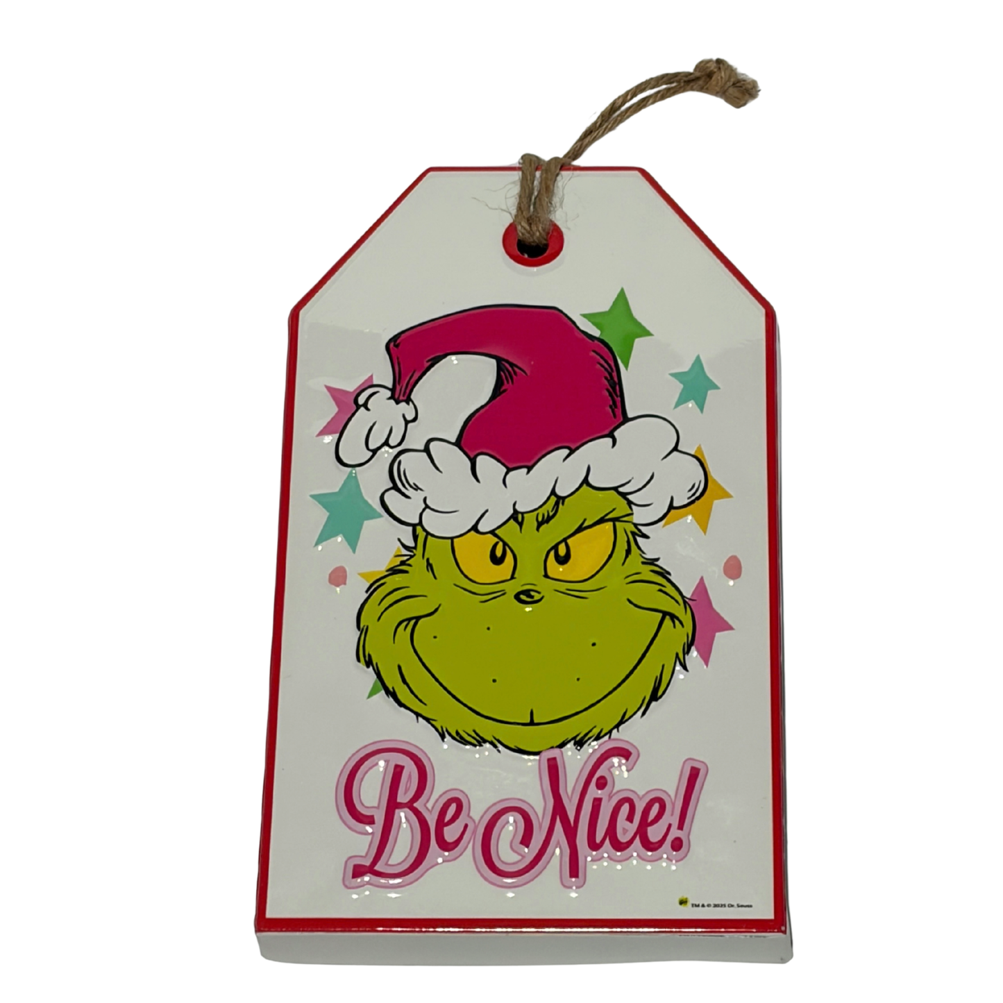 Door hanger featuring the Grinch wearing a Santa hat with colourful stars and the words “Be Nice!”
