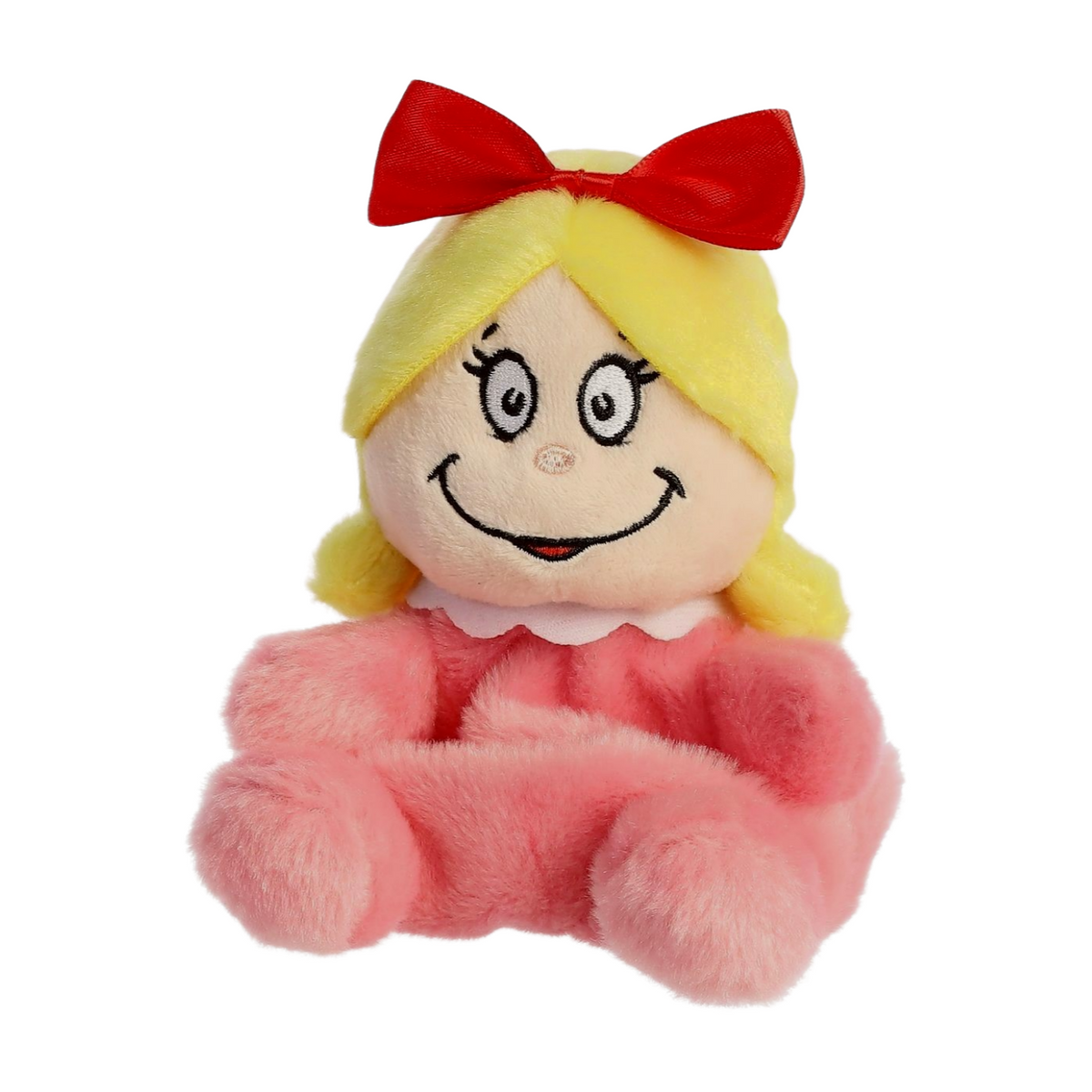 Small plush doll with blonde hair, red bow, pink outfit, and embroidered smiling face inspired by Cindy Lou from the Grinch