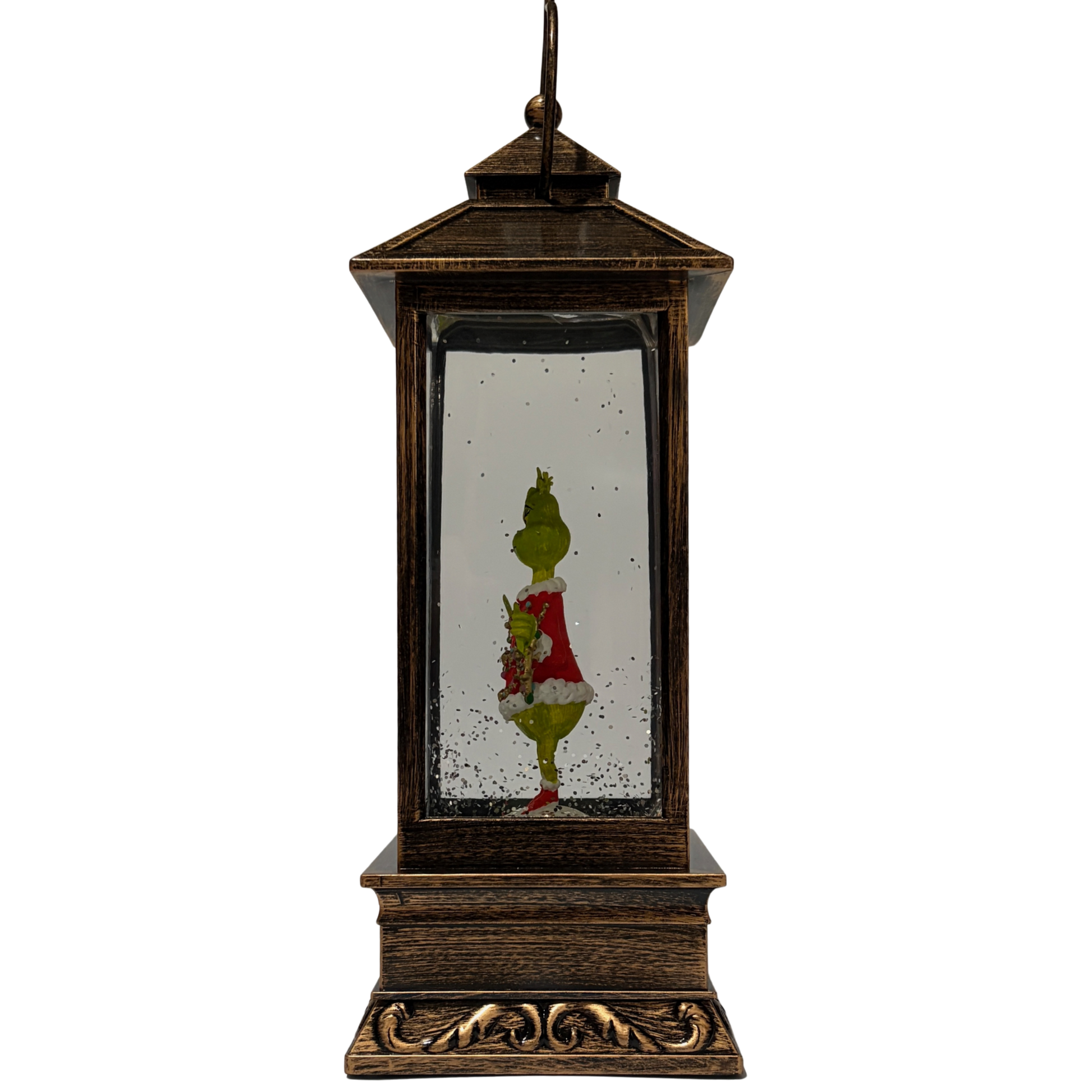 Bronze lantern-style snow globe featuring the Grinch in a red Santa outfit surrounded by swirling glitter
