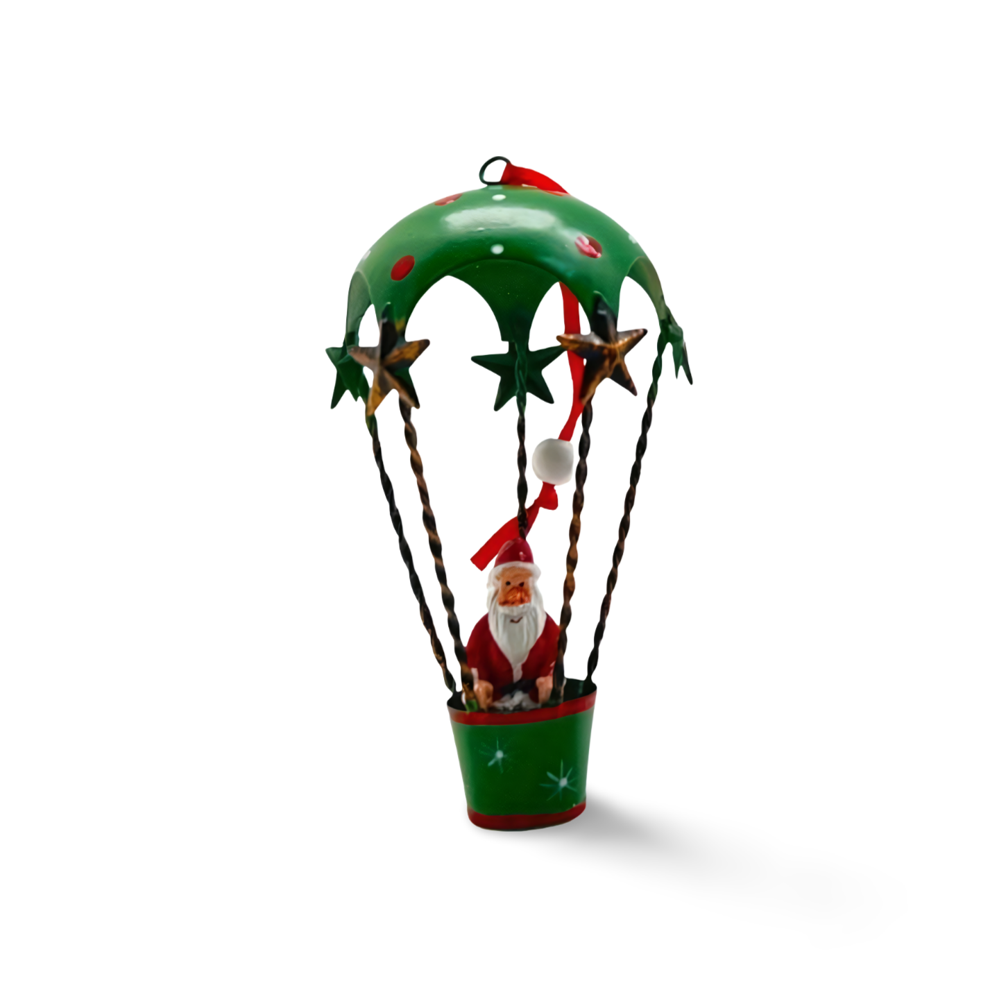 Three metal hot air balloon Christmas ornaments in red, green, and white, each with a festive character—Santa, snowman, or reindeer—riding in the basket with hanging ribbon.