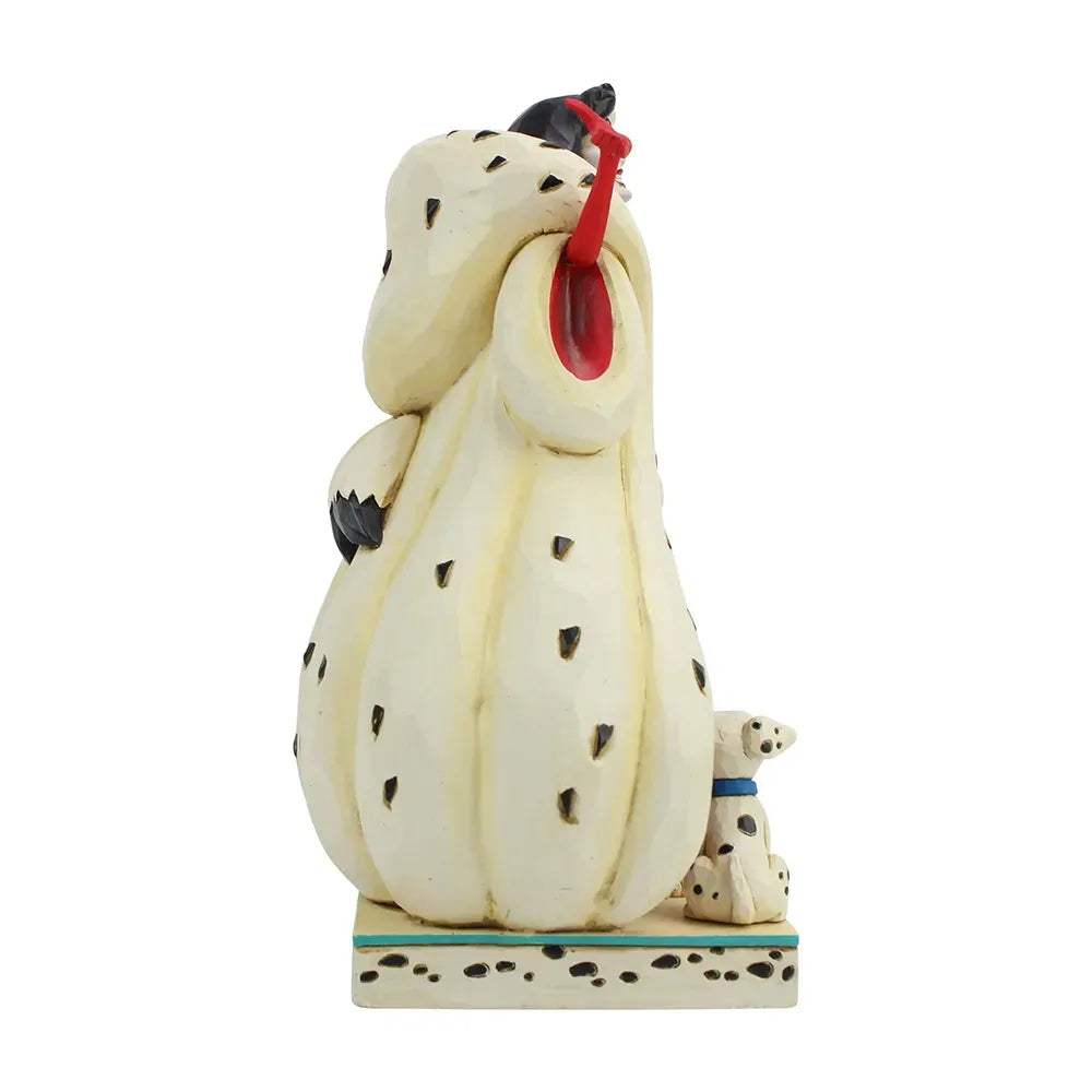 Cruella De Vil from 101 Dalmatians figurine rear view, large spotted coat with raised red hands, on a dalmatian spot base
