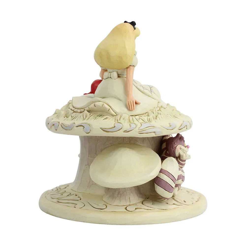 Alice in Wonderland white woodland figurine left view showing cream scrollwork mushroom with Cheshire Cat peeking from the base