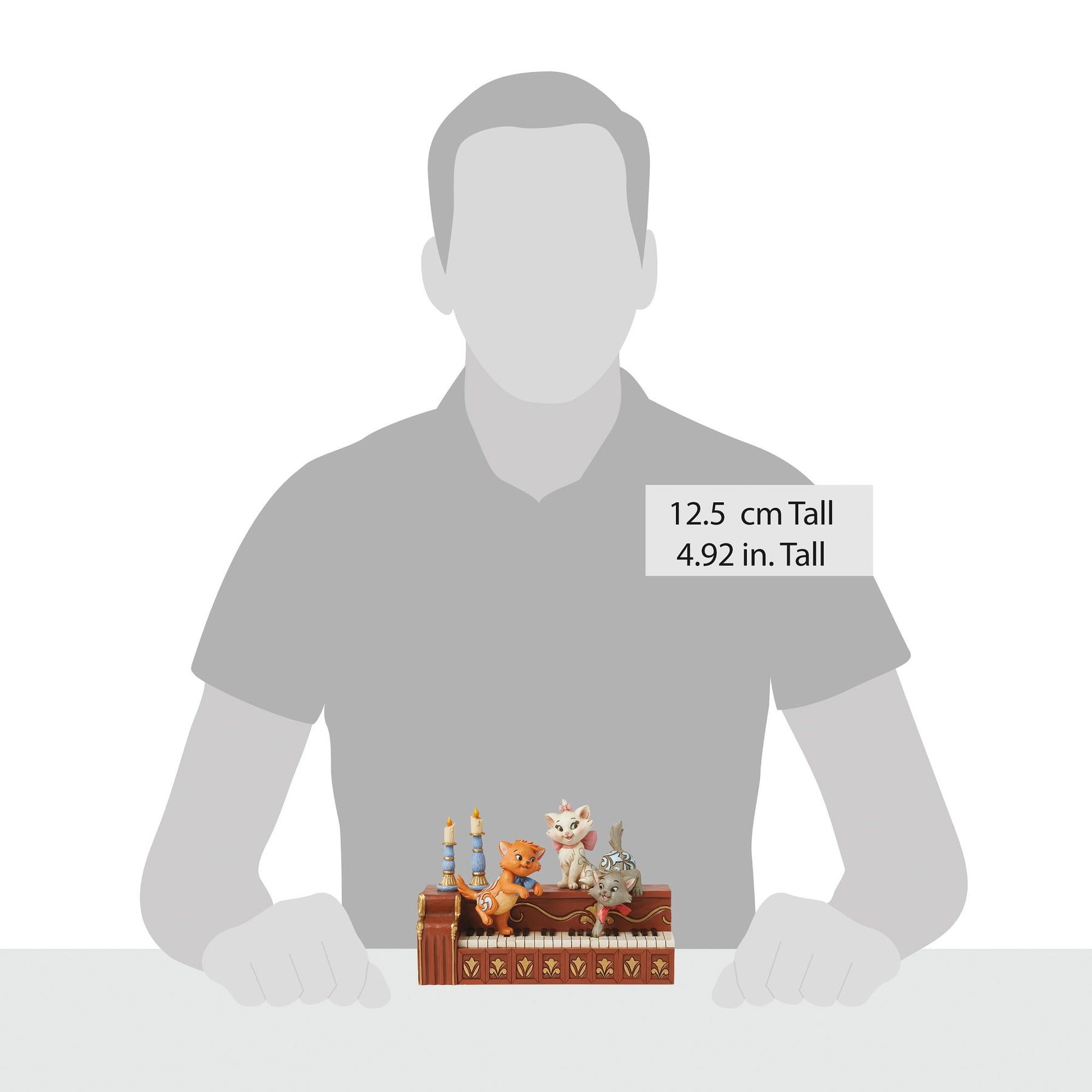 Aristocats kitten piano figurine size comparison with adult male silhouette, 12.5cm / 4.92 inches tall