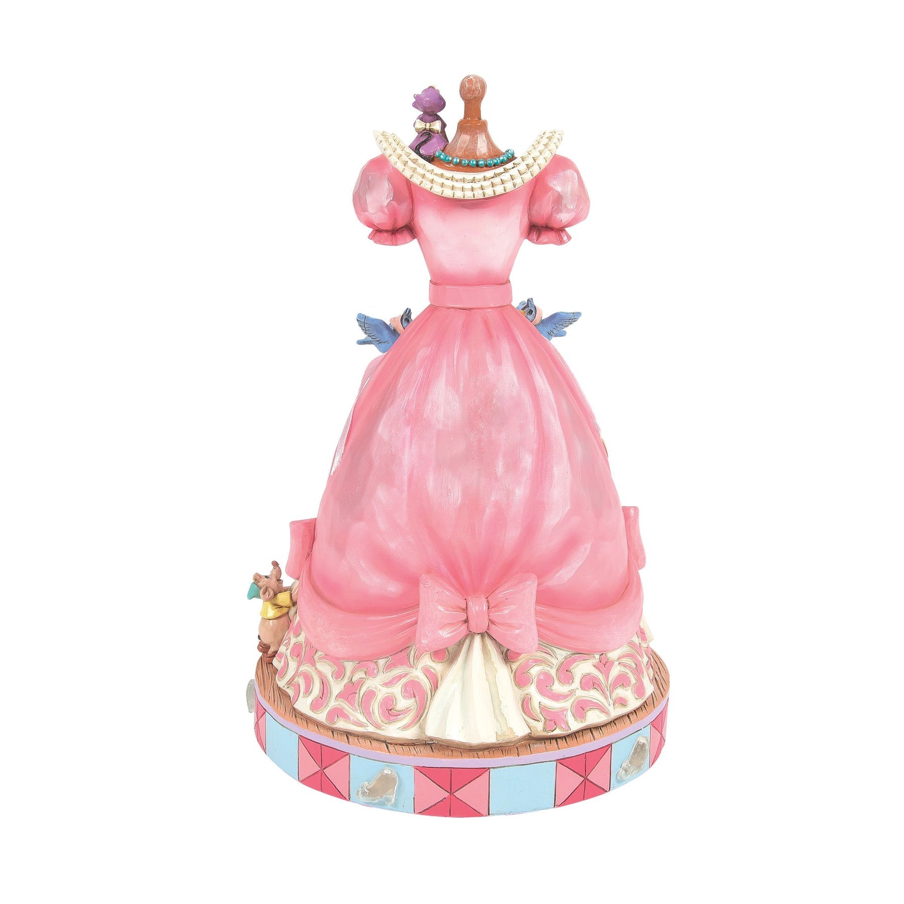 Rear view of Cinderella pink ball gown mannequin figurine with mice and bluebirds, scrollwork skirt, pink and blue base 