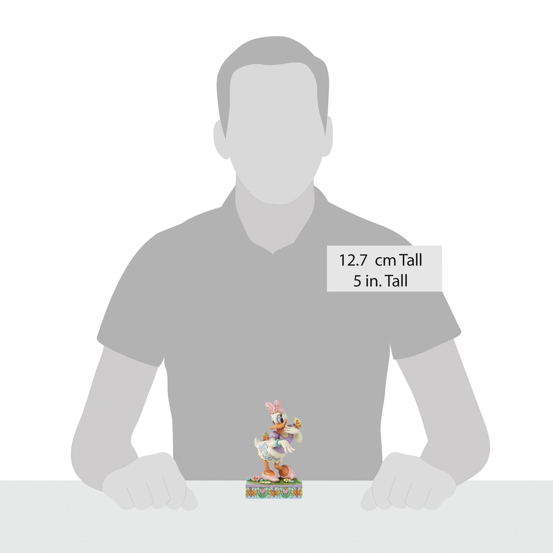 Daisy Duck spring figurine size comparison with adult male silhouette, 12.7cm / 5 inches tall