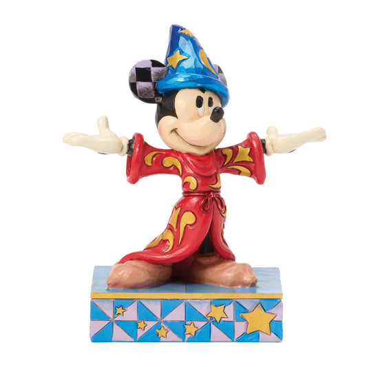 Sorcerer Mickey Mouse figurine in red robe with gold scrollwork, blue star hat, arms outstretched, star painted base 