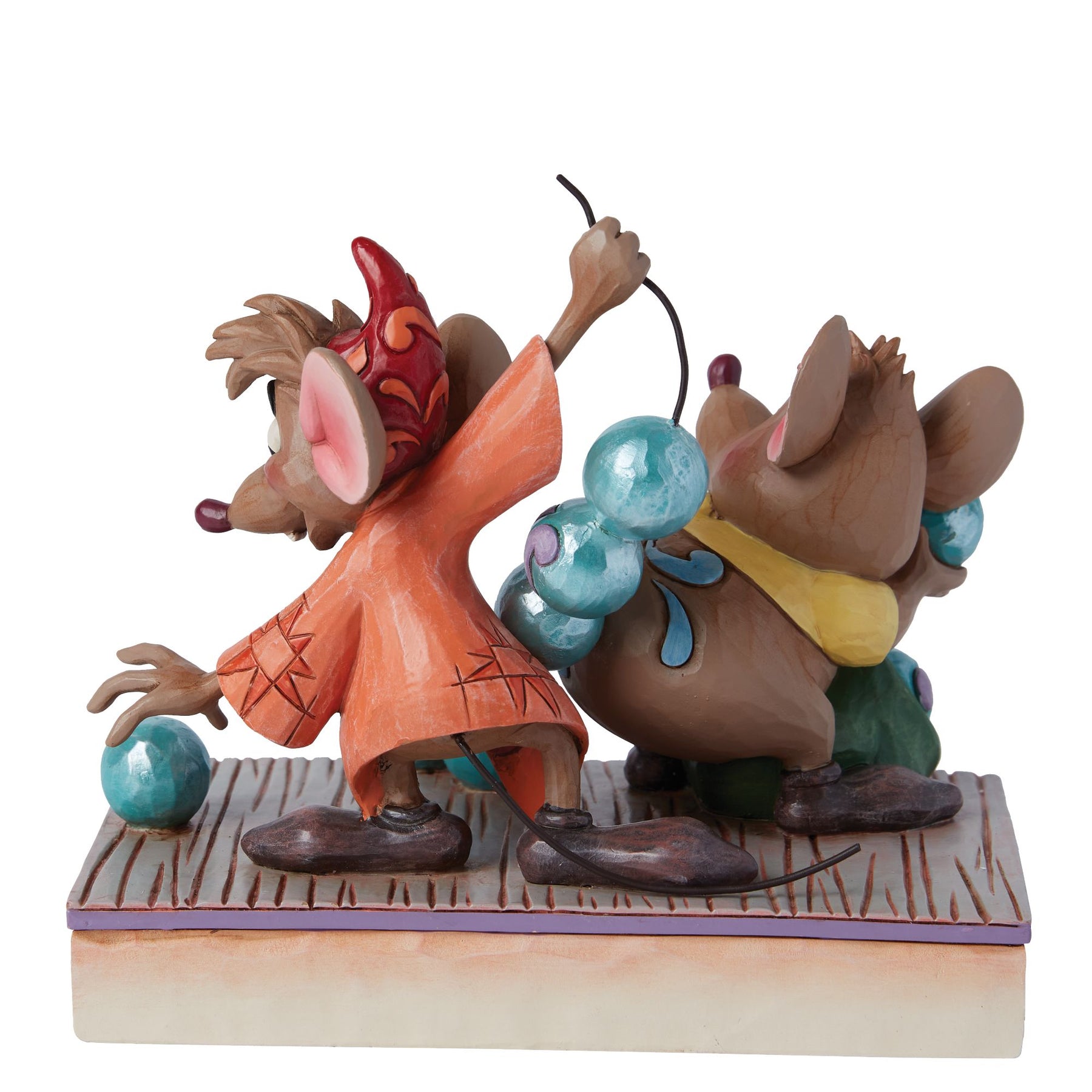 Rear view of Jaq and Gus figurine from Cinderella, carrying teal beads, on a painted floral base