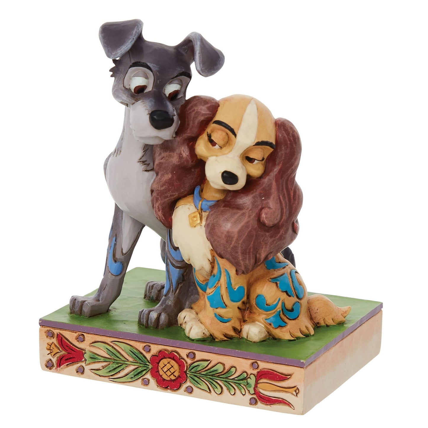 Lady and the Tramp figurine on plain background, showing the pair nestled together on a floral painted base