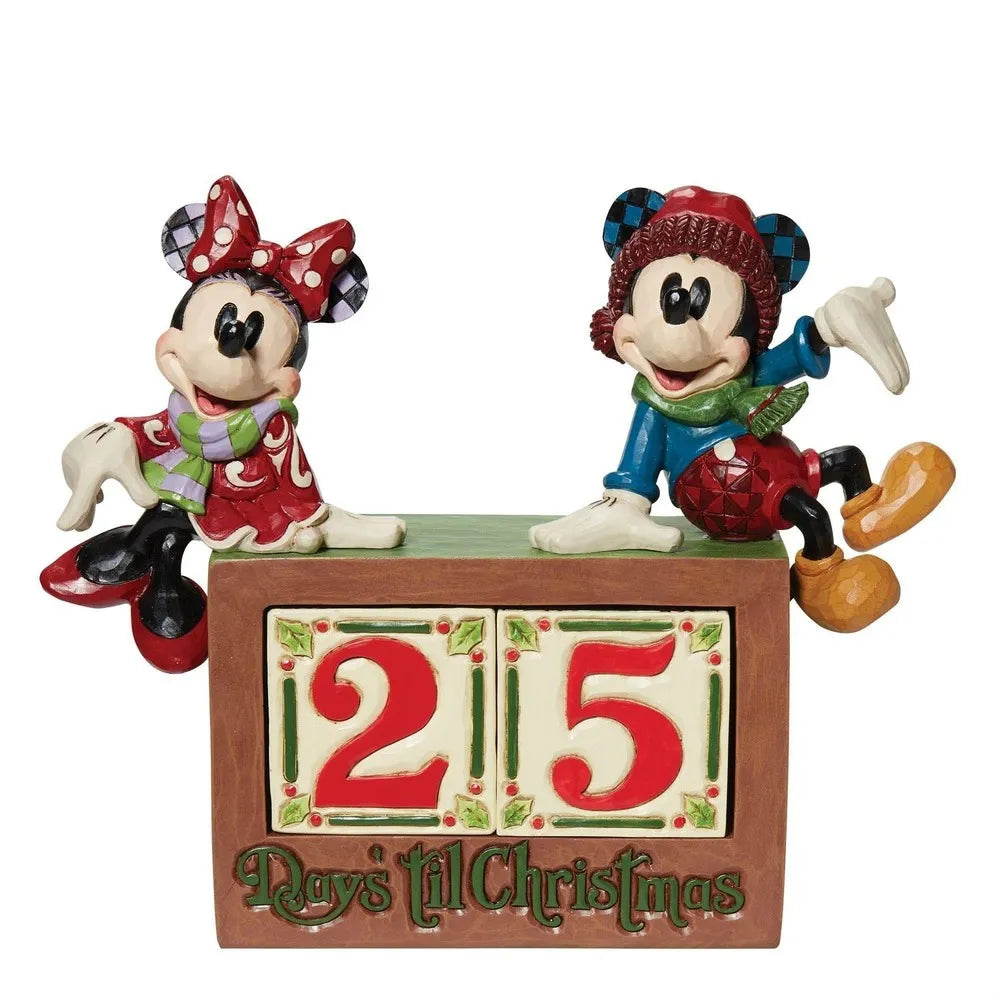 Front view of Mickey and Minnie Mouse Christmas figurines on a "25 Days 'til Christmas" countdown block with holly details. 