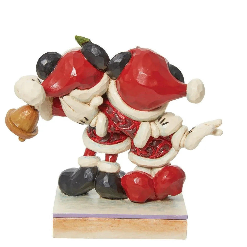 Back and side view of Mickey and Minnie Mouse Santa figurines embracing, Mickey holding a gold bell, on a painted base