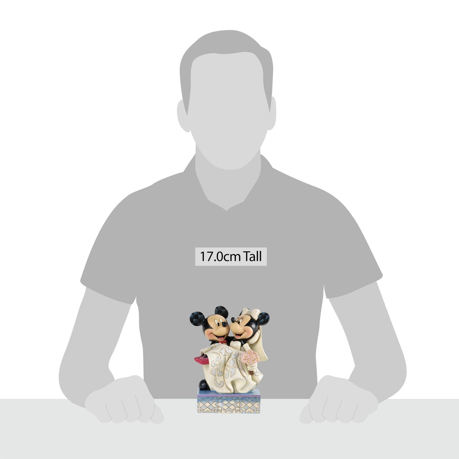 Size reference showing Mickey and Minnie wedding figurine beside a human silhouette, labelled 17 cm tall 