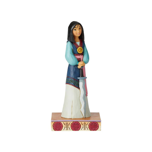 Mulan figurine standing with a sword, teal and blue robes with scrollwork trim, on a base with red Chinese symbol detailing