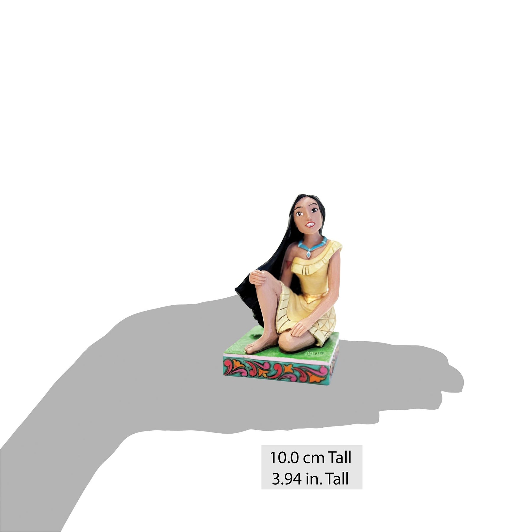 Pocahontas figurine shown on an open palm for scale, 10cm / 3.94 inches tall