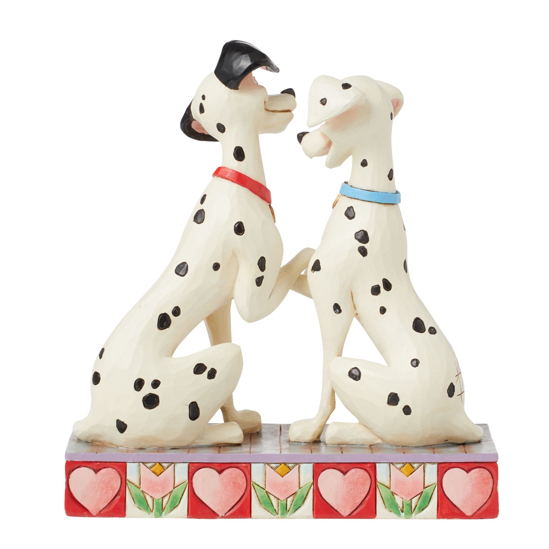 Rear view of Pongo and Perdita figurine from 101 Dalmatians nose to nose, red and blue collars, heart and tulip base