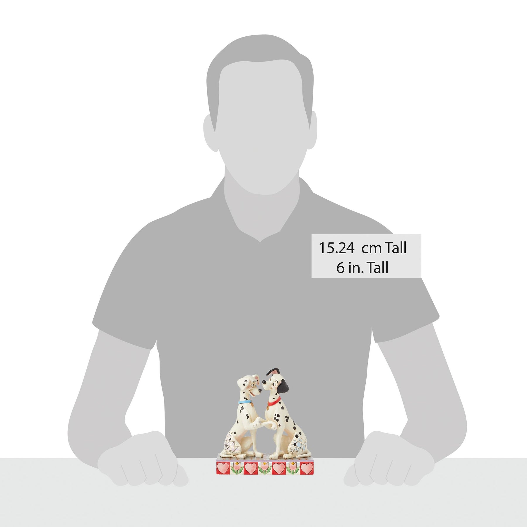 Pongo and Perdita figurine size comparison with adult male silhouette, 15.24cm / 6 inches tall