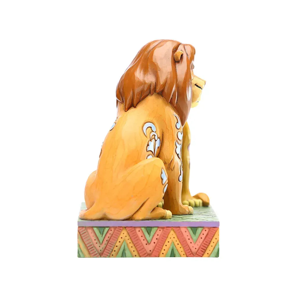 Simba and Nala Lion King figurine left side view, nuzzling pose showing pink and blue scrollwork, on a chevron painted base 
