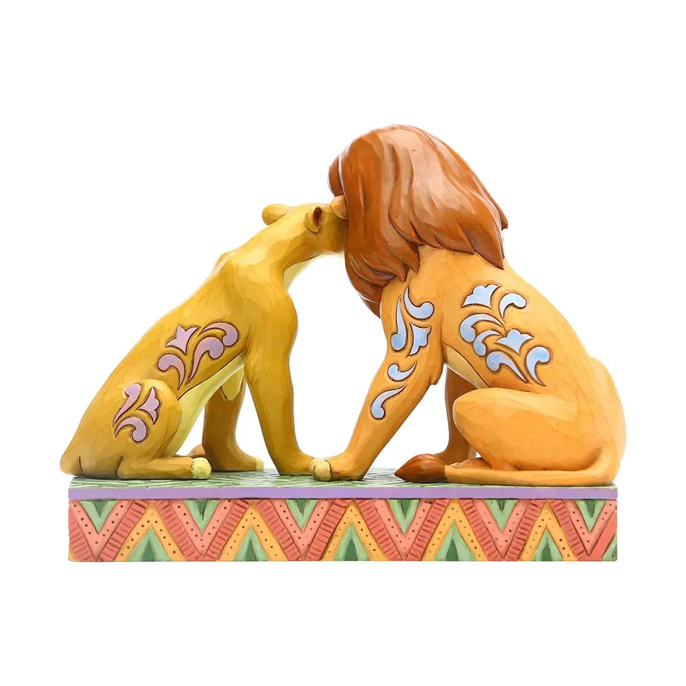 Simba and Nala from The Lion King figurine rear view, scrollwork body detail on both lions, on a colourful chevron painted base