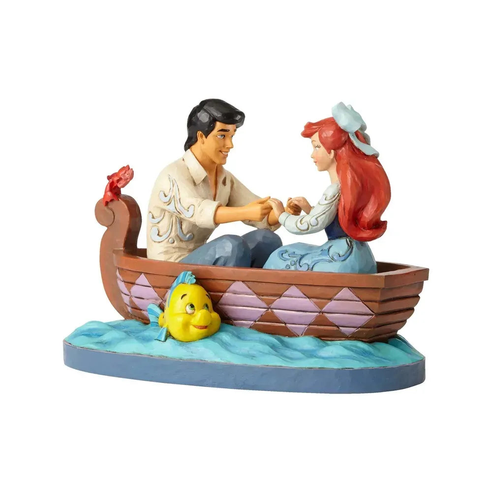 Ariel and Prince Eric Little Mermaid rowboat figurine, alternate front angle showing Flounder beneath the boat and Sebastian on stern
