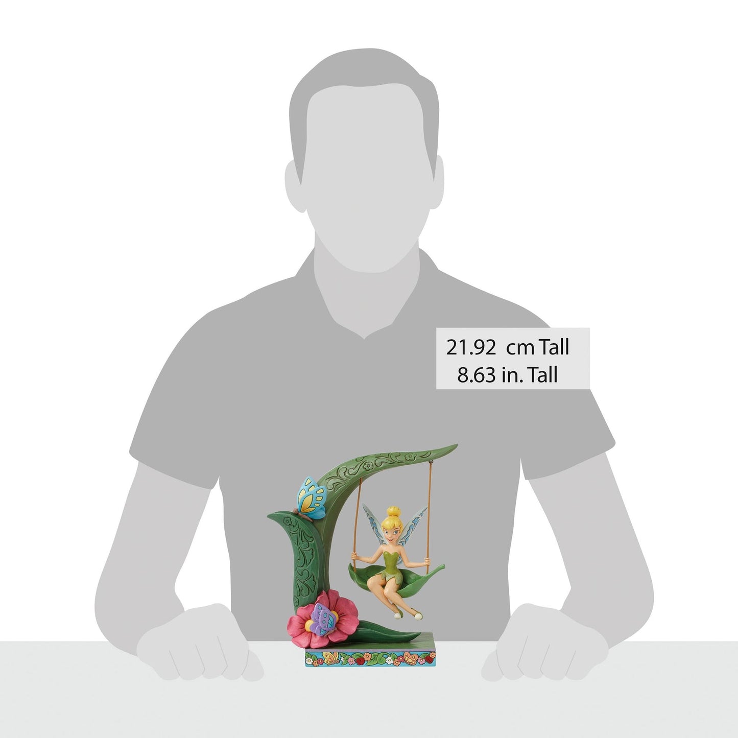Tinker Bell on leaf swing figurine size comparison with adult male silhouette, 21.92cm / 8.63 inches tall