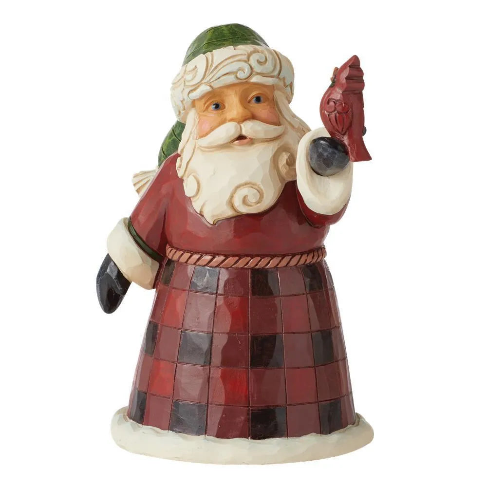Three-quarter view of Santa figurine in green tasselled hat and red plaid robe, holding a red cardinal, scrollwork beard