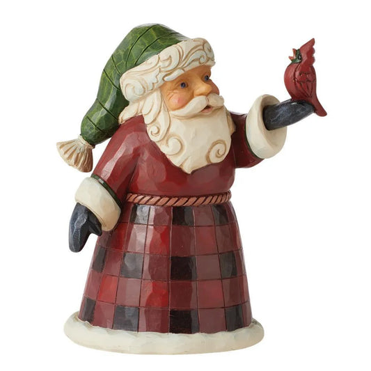 Front view of Santa figurine in green hat and red plaid robe, holding a red cardinal bird, scrollwork beard detail