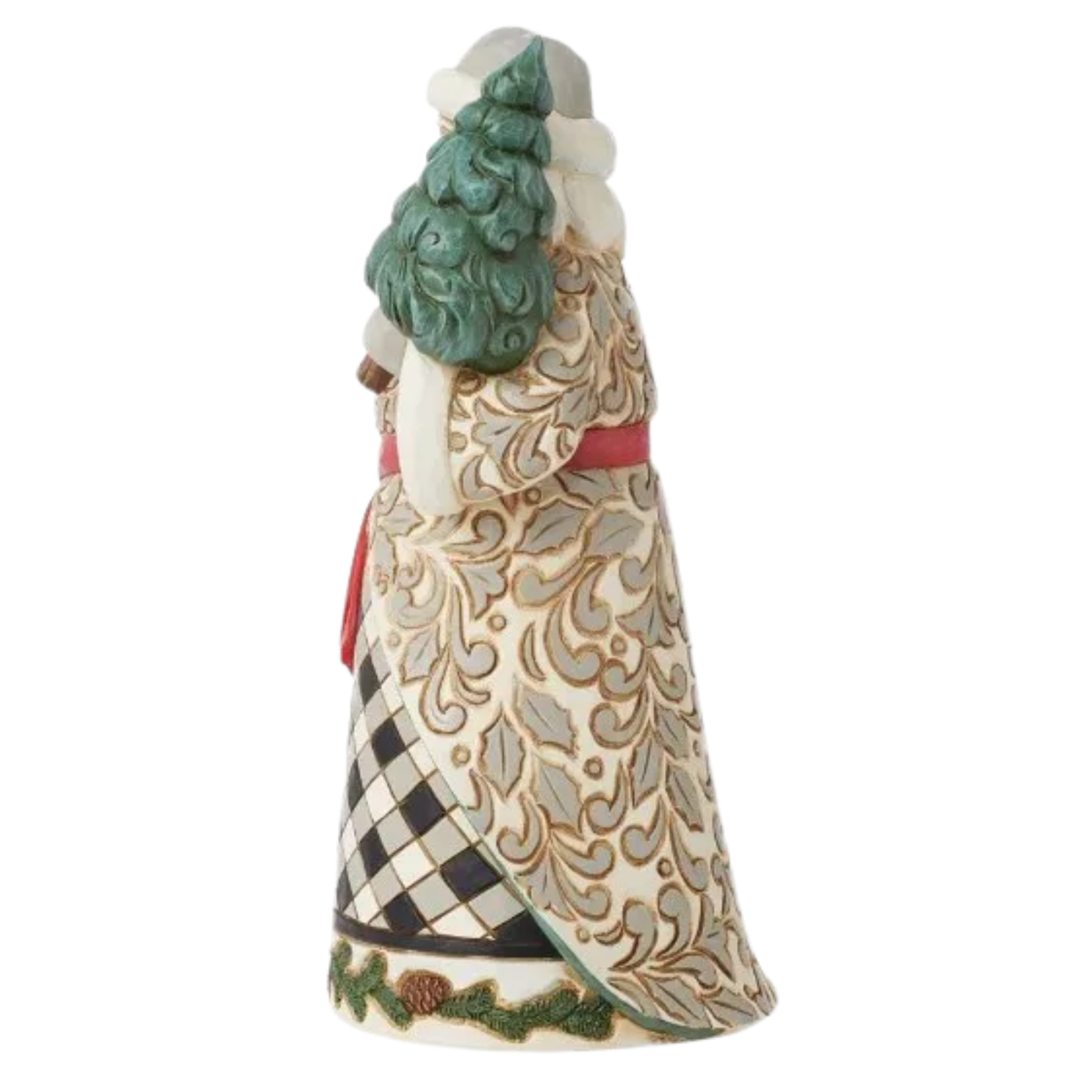 Side view of a Jim Shore Santa figurine in a black and white checked robe with gold scrollwork and a green tree. 