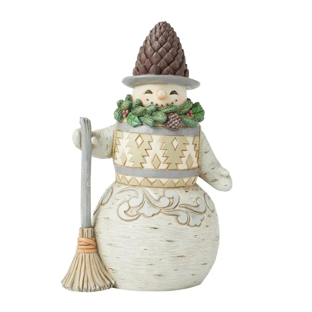 Woodland snowman figurine with pinecone hat, evergreen wreath collar, gold tree-pattern vest, broom, scroll-detailed white base