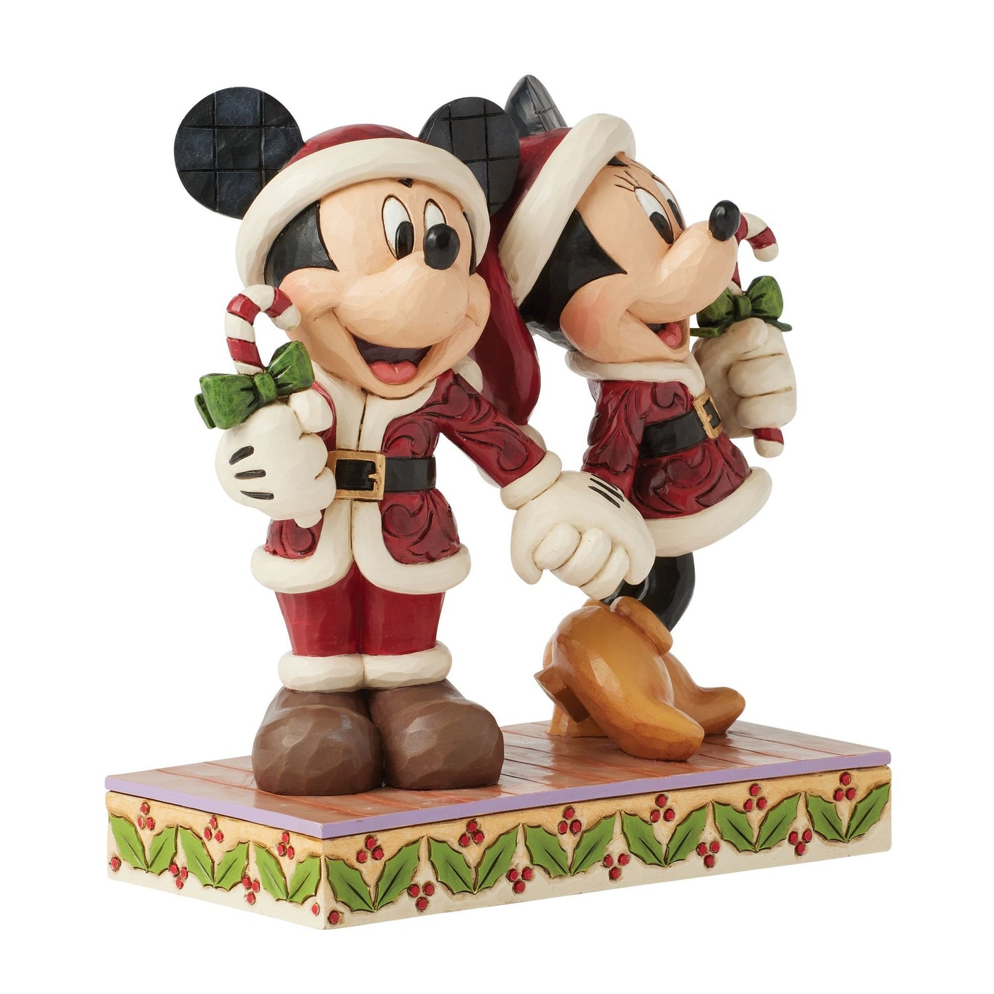 Jim Shore Mickey and Minnie Mouse figurine holding hands in matching Santa suits with candy canes

