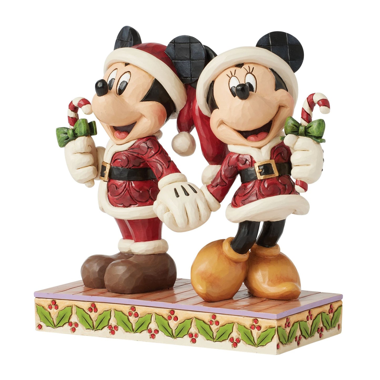 Front view of Jim Shore Mickey and Minnie Mouse figurine dressed as Santa holding candy canes
