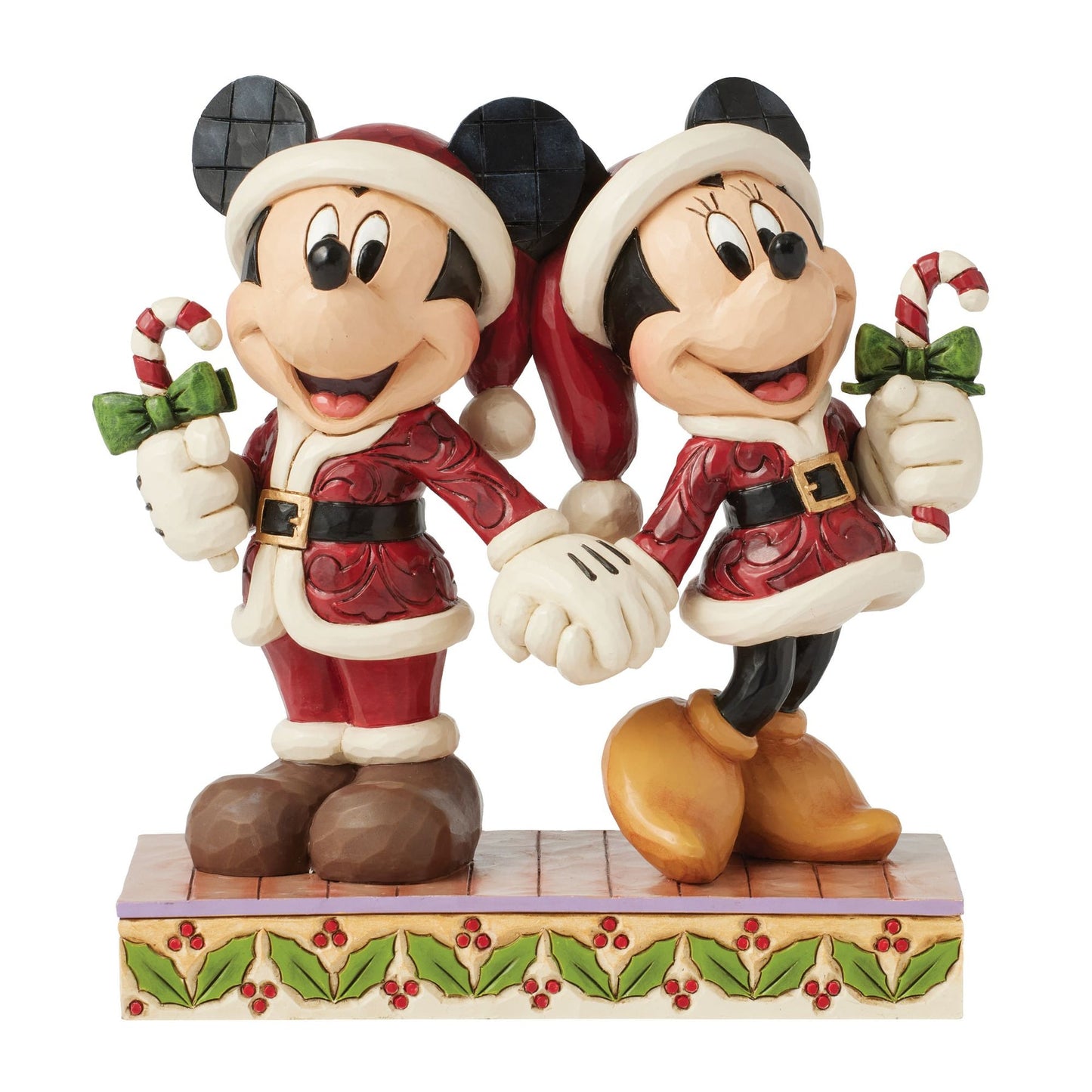 Front close-up of Jim Shore Mickey and Minnie Mouse figurine holding candy canes in Santa outfits
