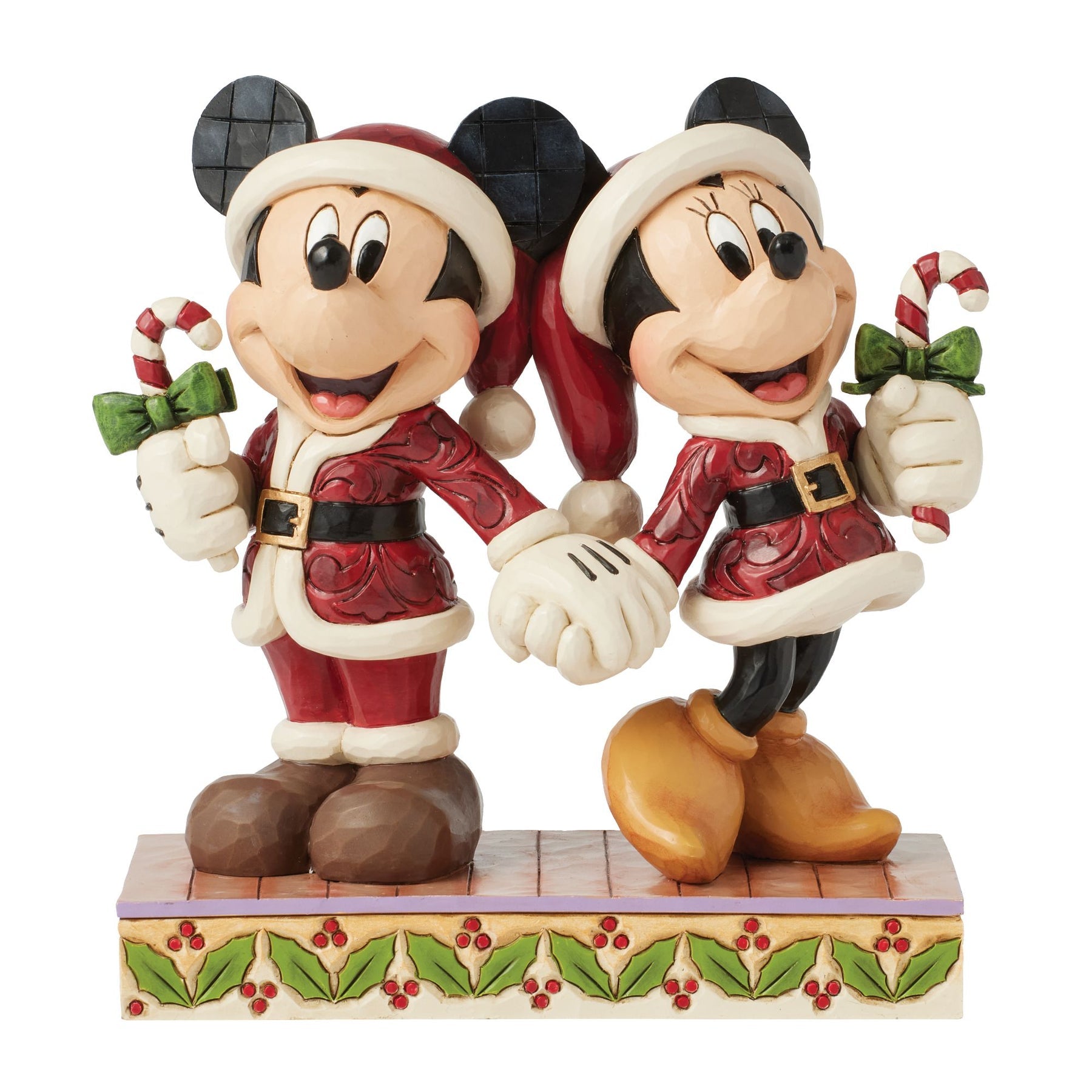 Front close-up of Jim Shore Mickey and Minnie Mouse figurine holding candy canes in Santa outfits
