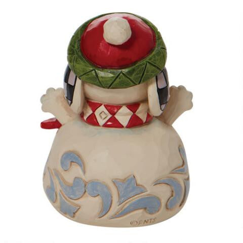 Rear view of Jim Shore Peanuts Snoopy snowman figurine showing folk-art swirl detailing
