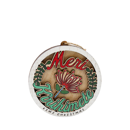 Kiwi Christmas wooden hanging ornament featuring a pōhutukawa flower and Meri Kirihimete text