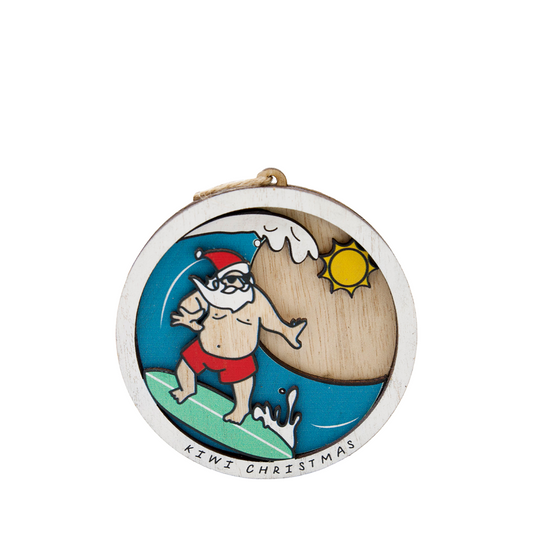 Kiwi Christmas wooden hanging ornament featuring Santa surfing a wave