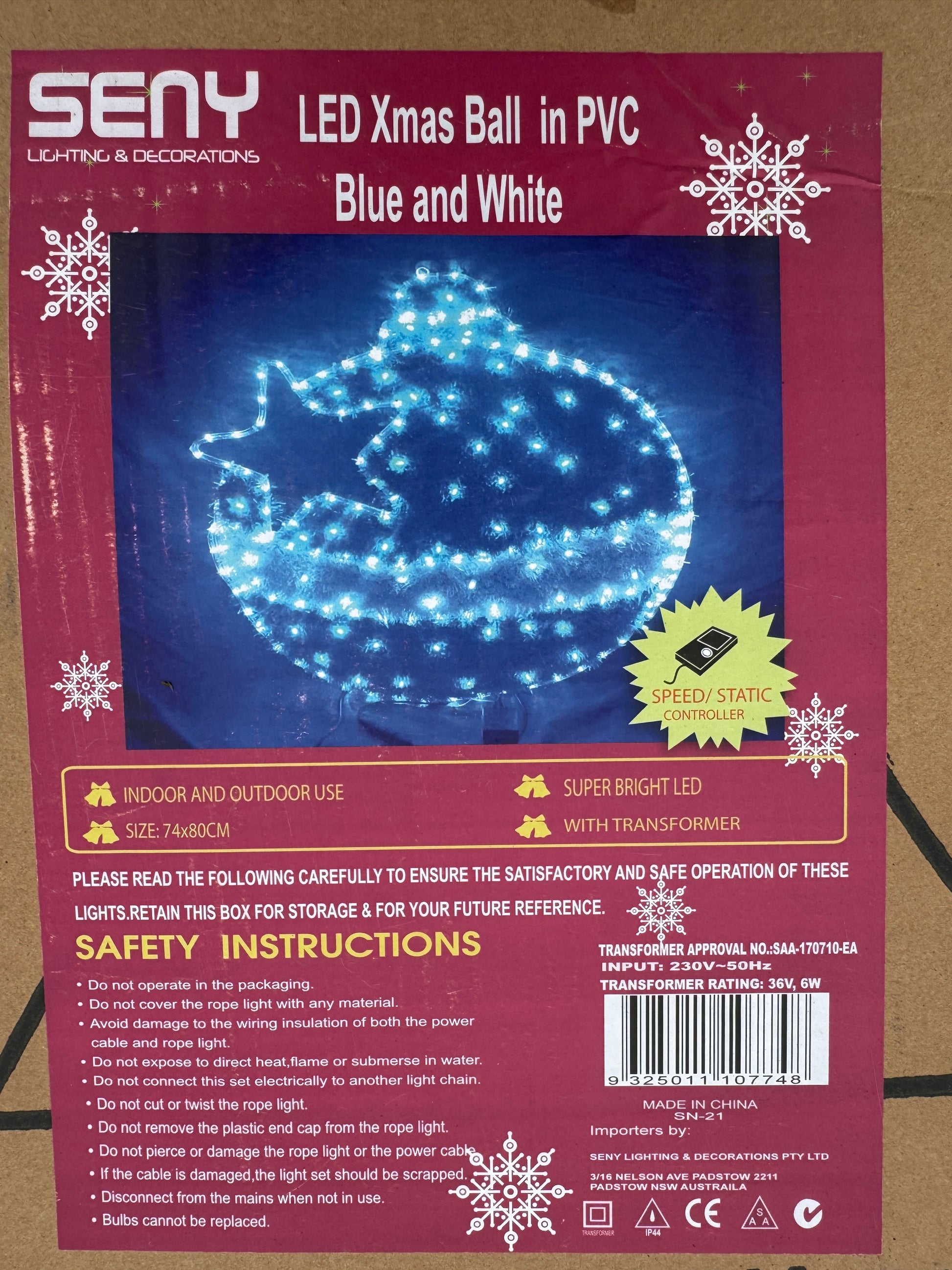 Illuminated blue and white bauble-shaped Christmas light with star cut-out design