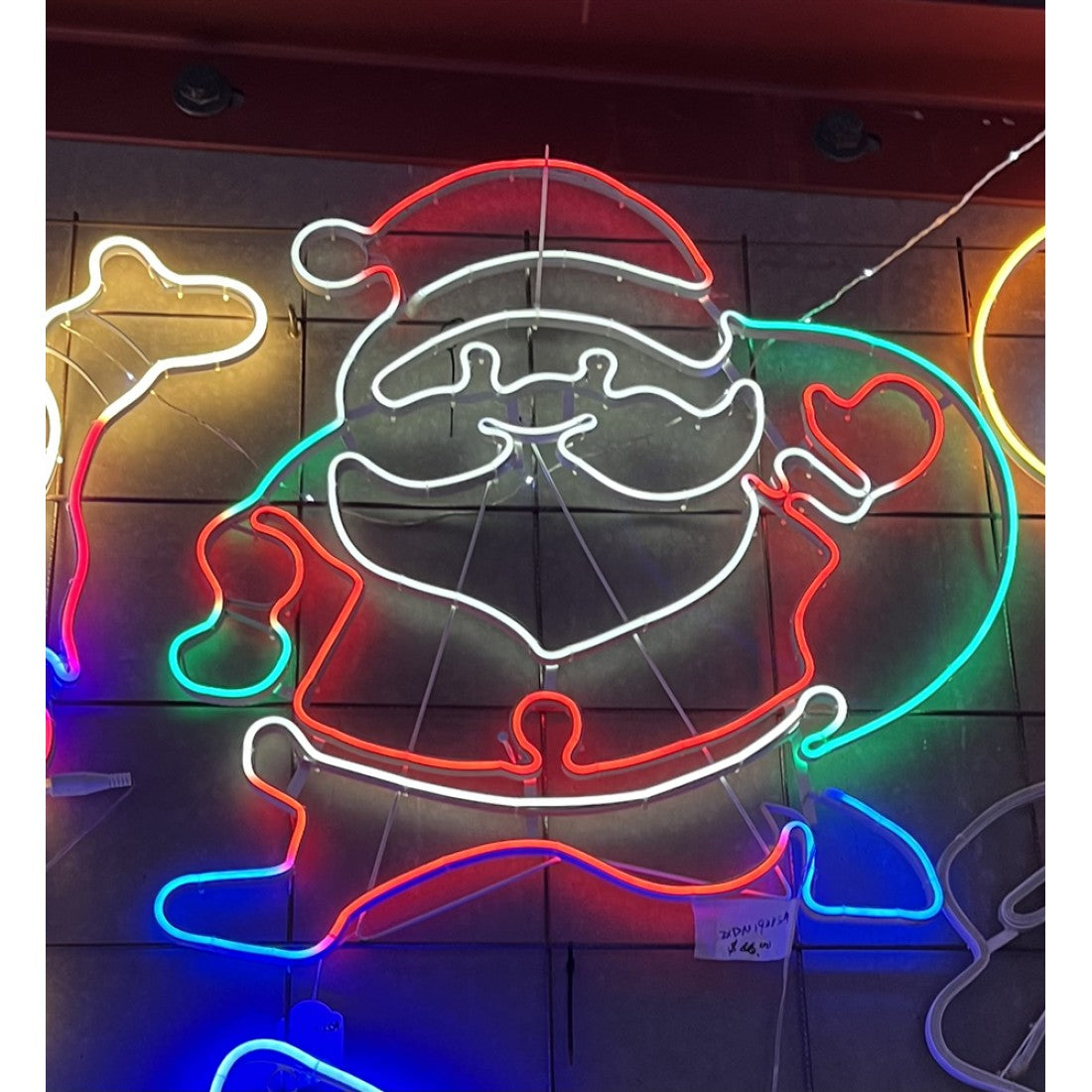 Neon-style LED Santa light in red, white, green, and blue colours