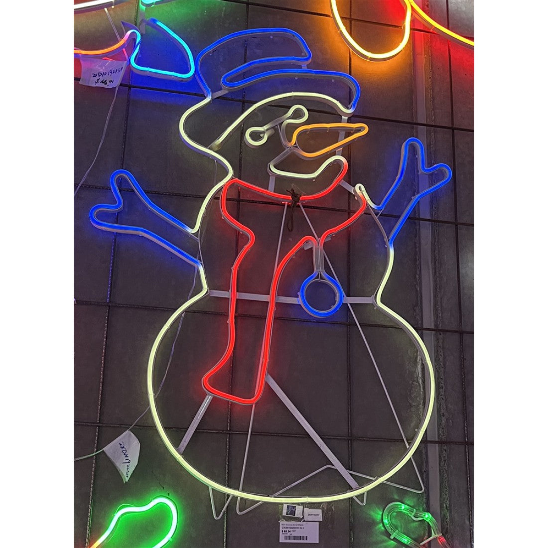 Neon-style LED snowman light with blue hat, red scarf, orange nose, and white outline