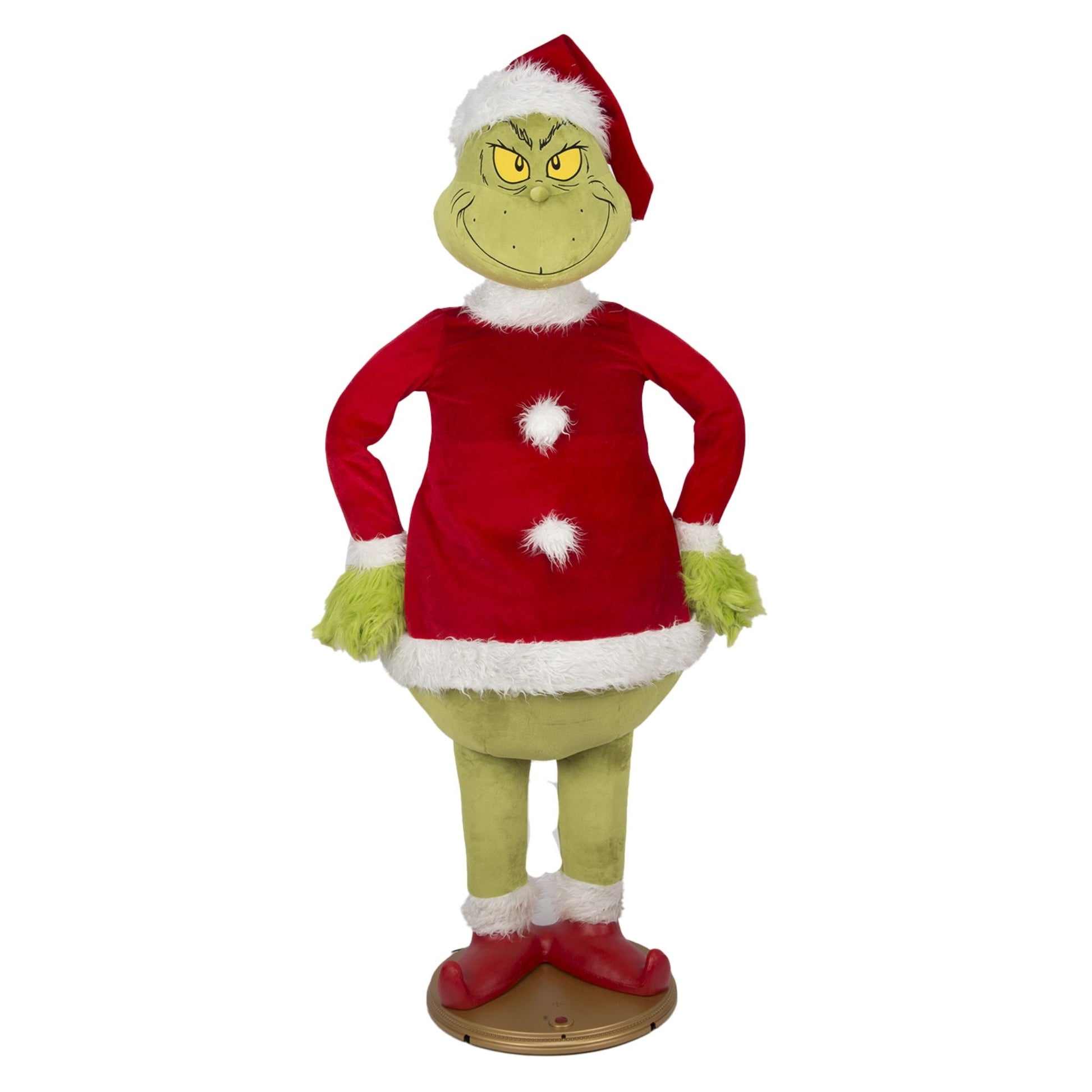 Life-size animated Grinch wearing red Santa outfit standing on display base