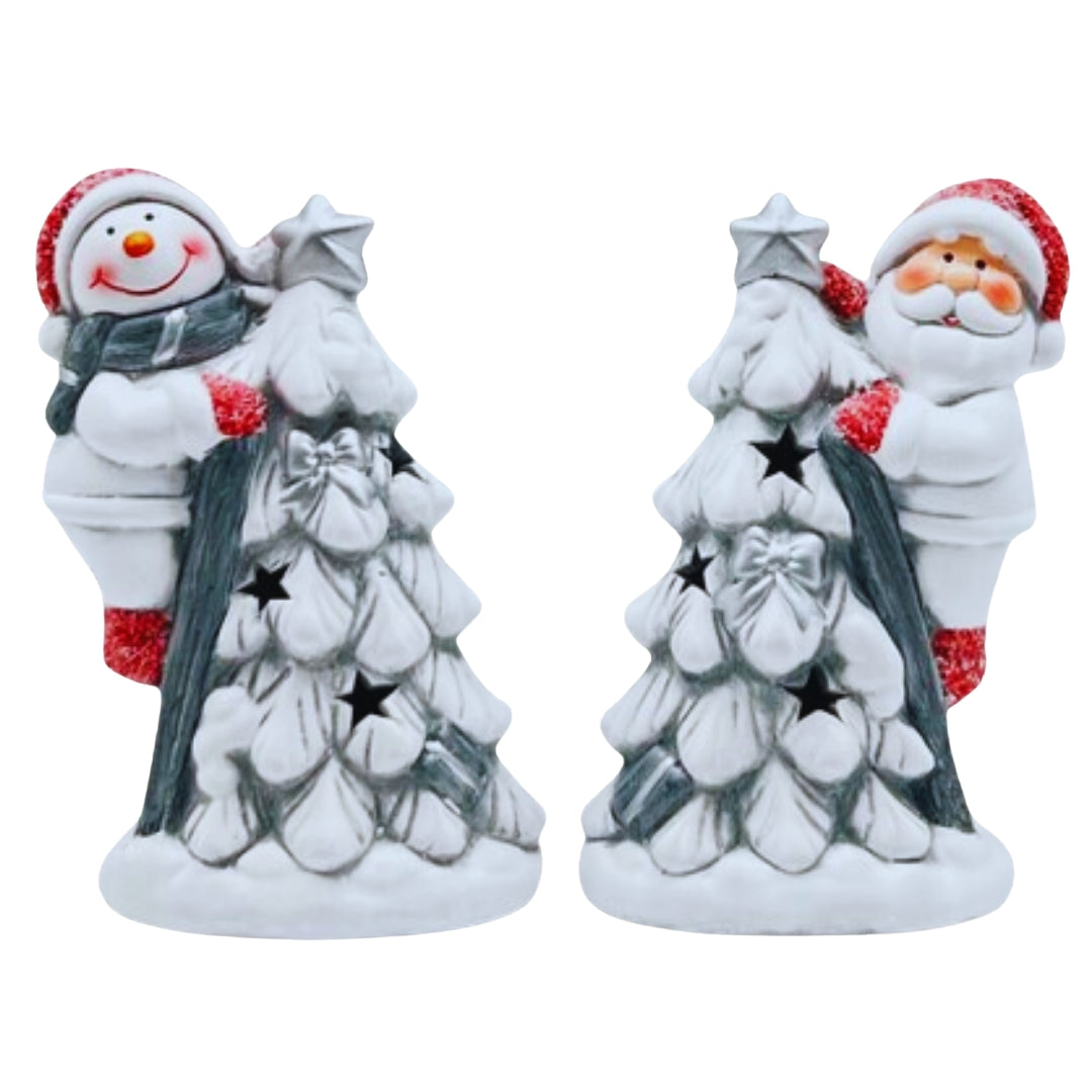 Two white light-up Christmas tree decorations, one with a snowman and one with Santa, with star cut-outs