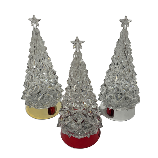 Three silver Christmas tree decorations with star toppers on a white background