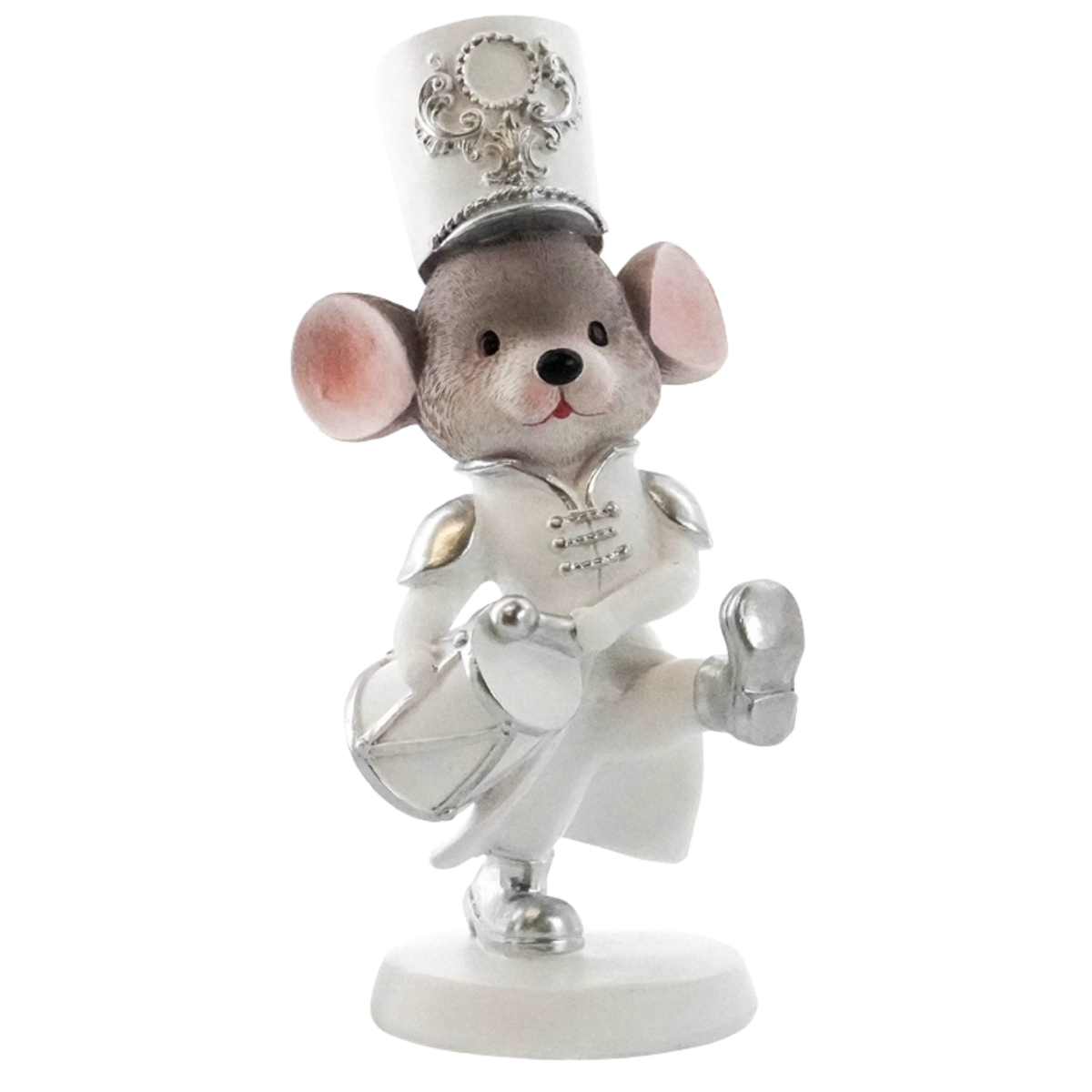 Marching mouse figurine in a white and silver band uniform with a tall ceremonial hat, playing a drum with one leg raised