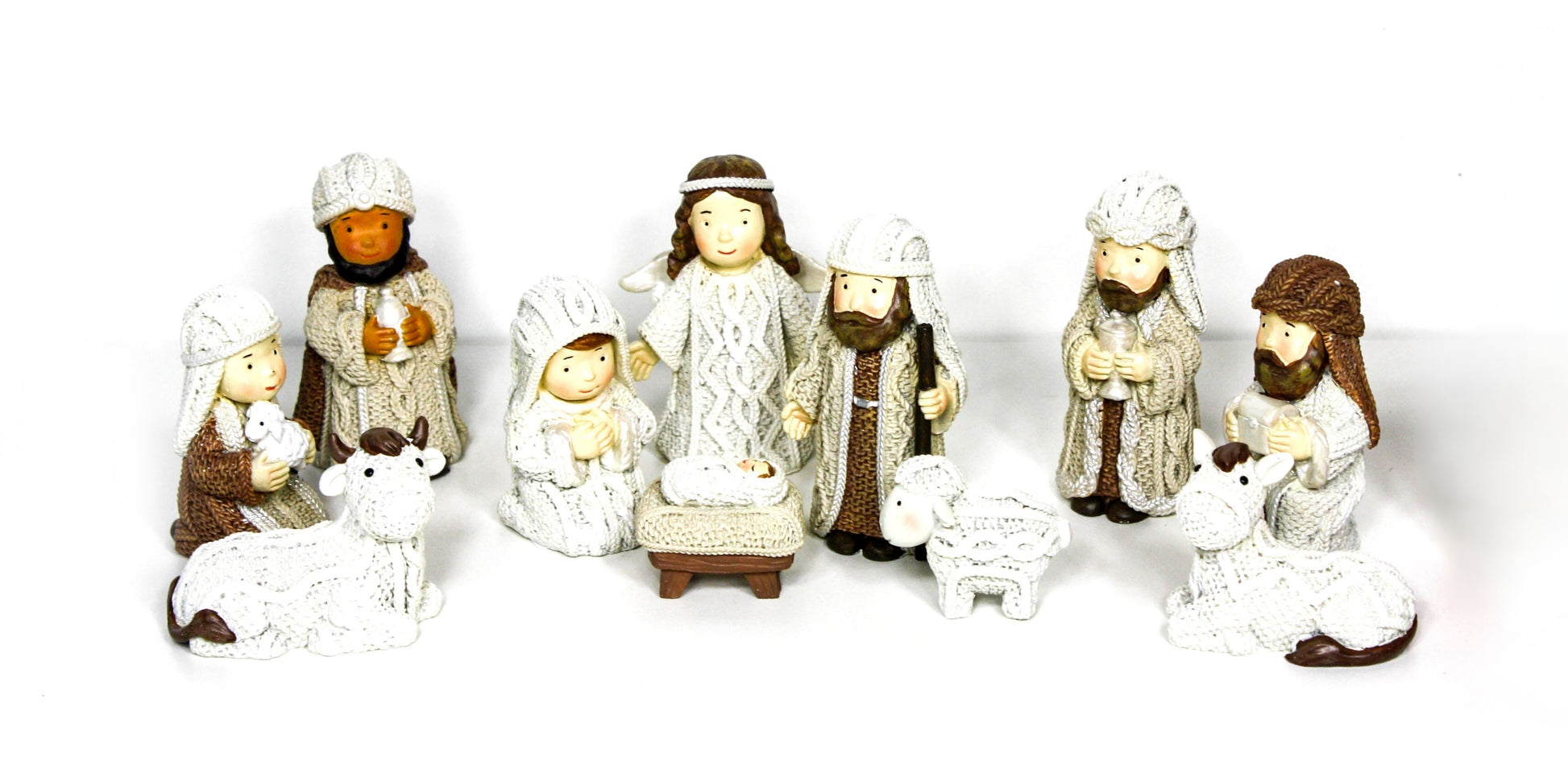 Miniature nativity scene with Mary, Joseph, Baby Jesus, Wise Men, shepherds, and animals in knitted-style detailing
