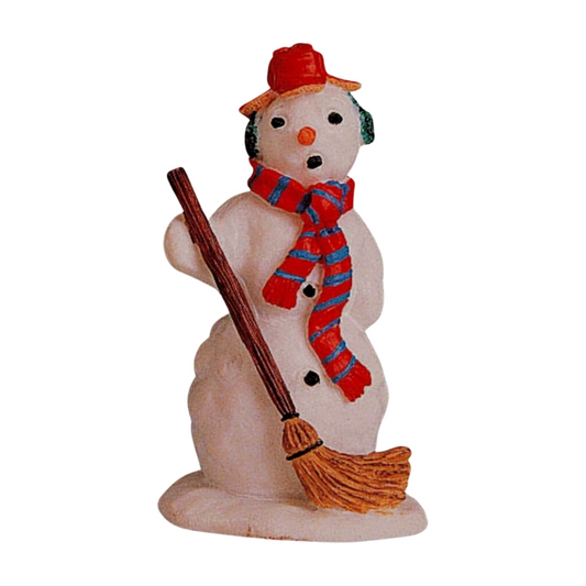 Lemax snowman figurine wearing a red hat, striped red and blue scarf, and ear muffs, leaning on a broom