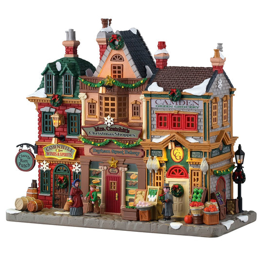 Lemax Mrs. Cratchit's Christmas Shoppes with wine, bakery and grocery storefronts, lit windows