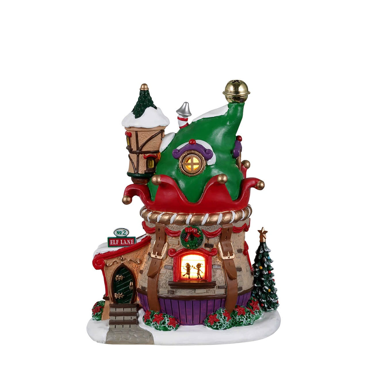 Side view of Lemax elf hat house with green and red roof, lit round window and Christmas tree