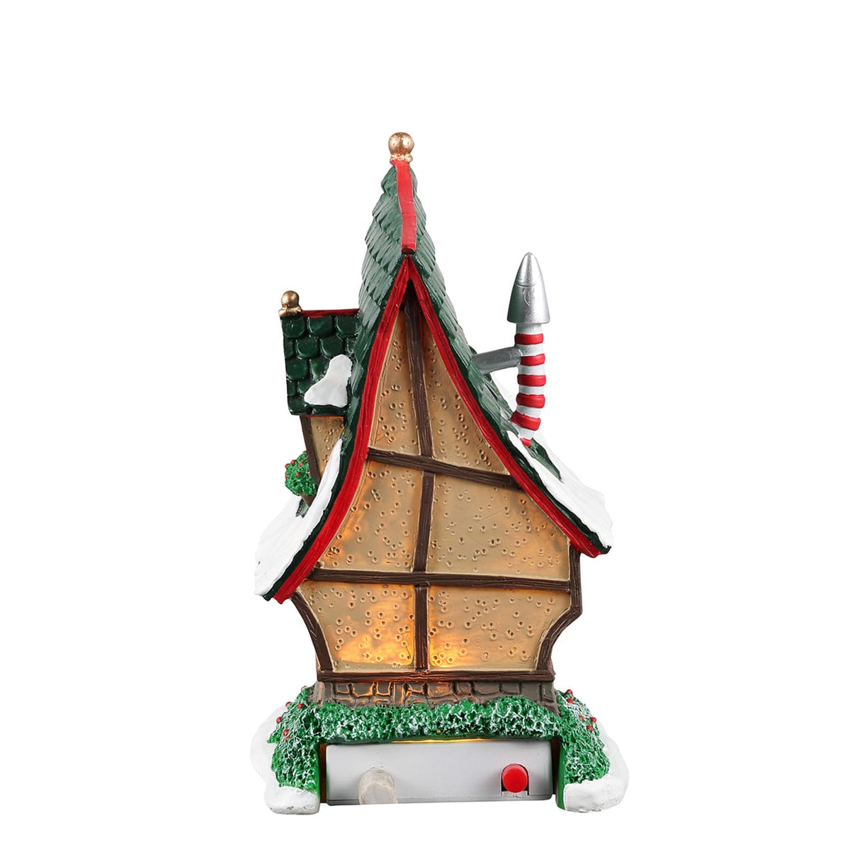 Rear view of Lemax Elf Lane house showing steep green roof and lit timber-framed windows