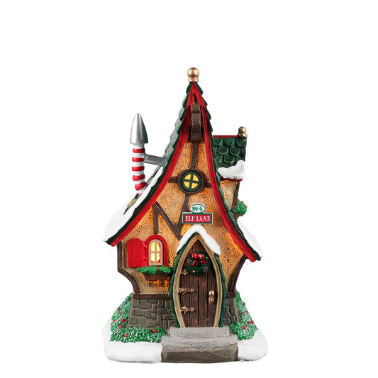 Lemax Elf Lane No.4 house with a tall green tiled roof and snow-dusted timber frame