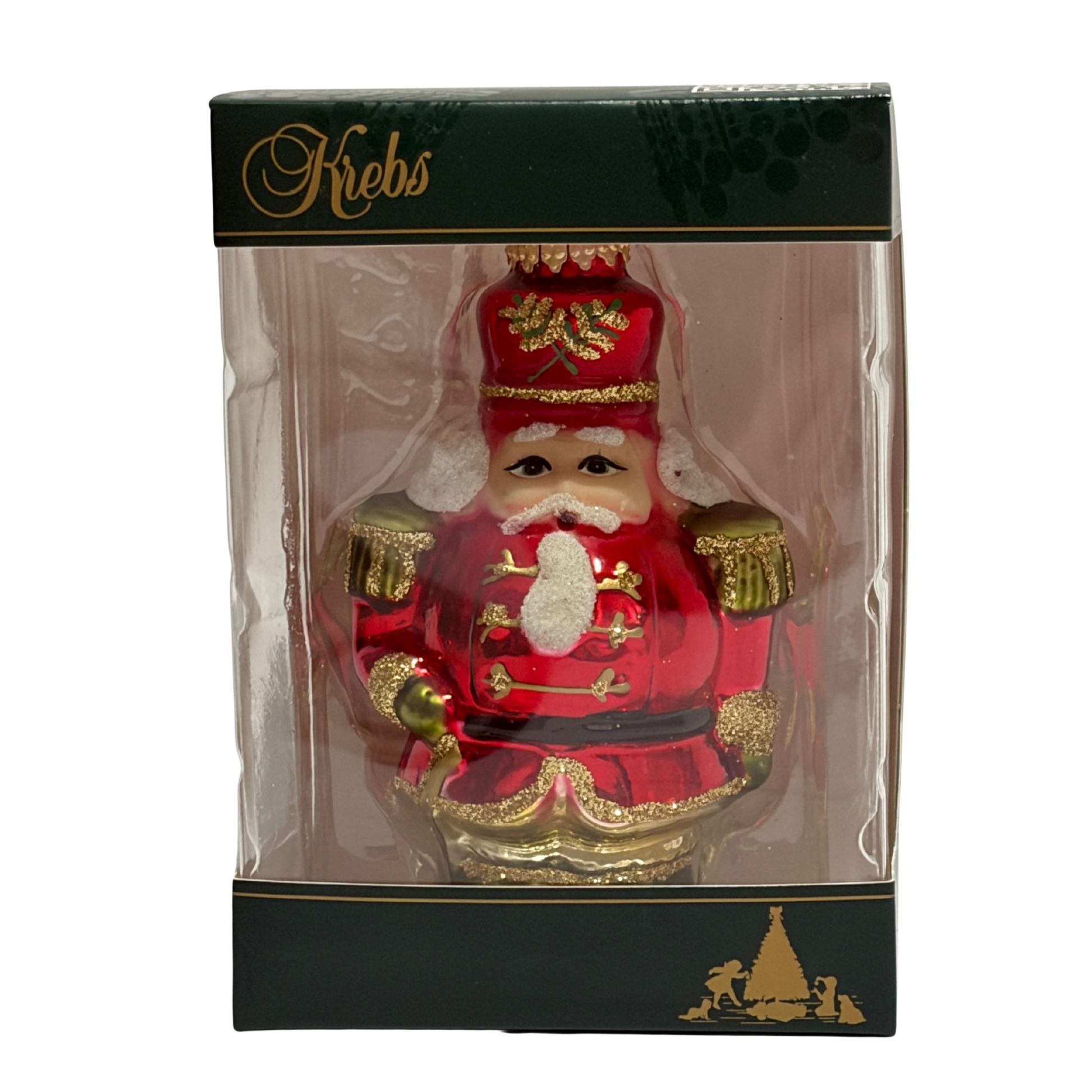 Red and gold nutcracker ornament in clear packaging with 'Krebs' branding.
