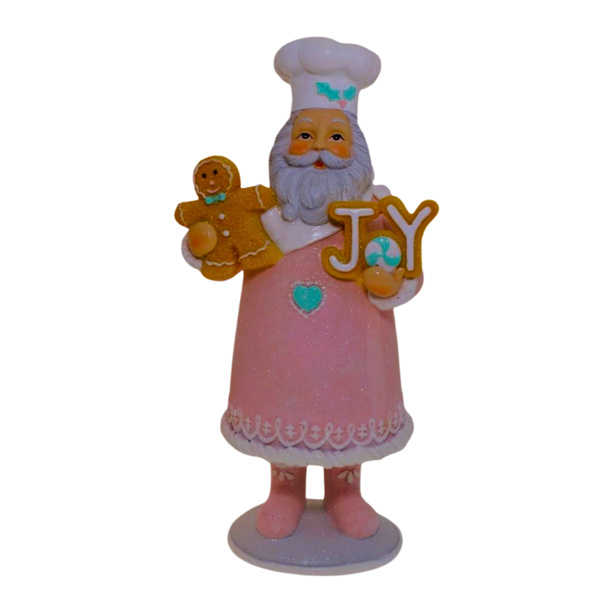 Pastel pink Santa chef figurine holding a gingerbread man and glittered Joy sign