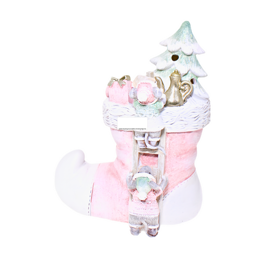 Pastel Christmas tree figurine featuring mice decorating with gingerbread men and gifts